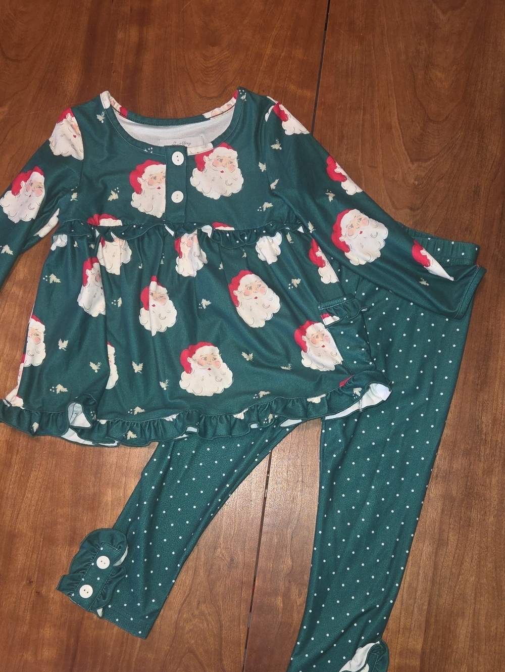 Girls Green Santa Print Pajama Set with Ruffle Top and Polka Dot Leggings